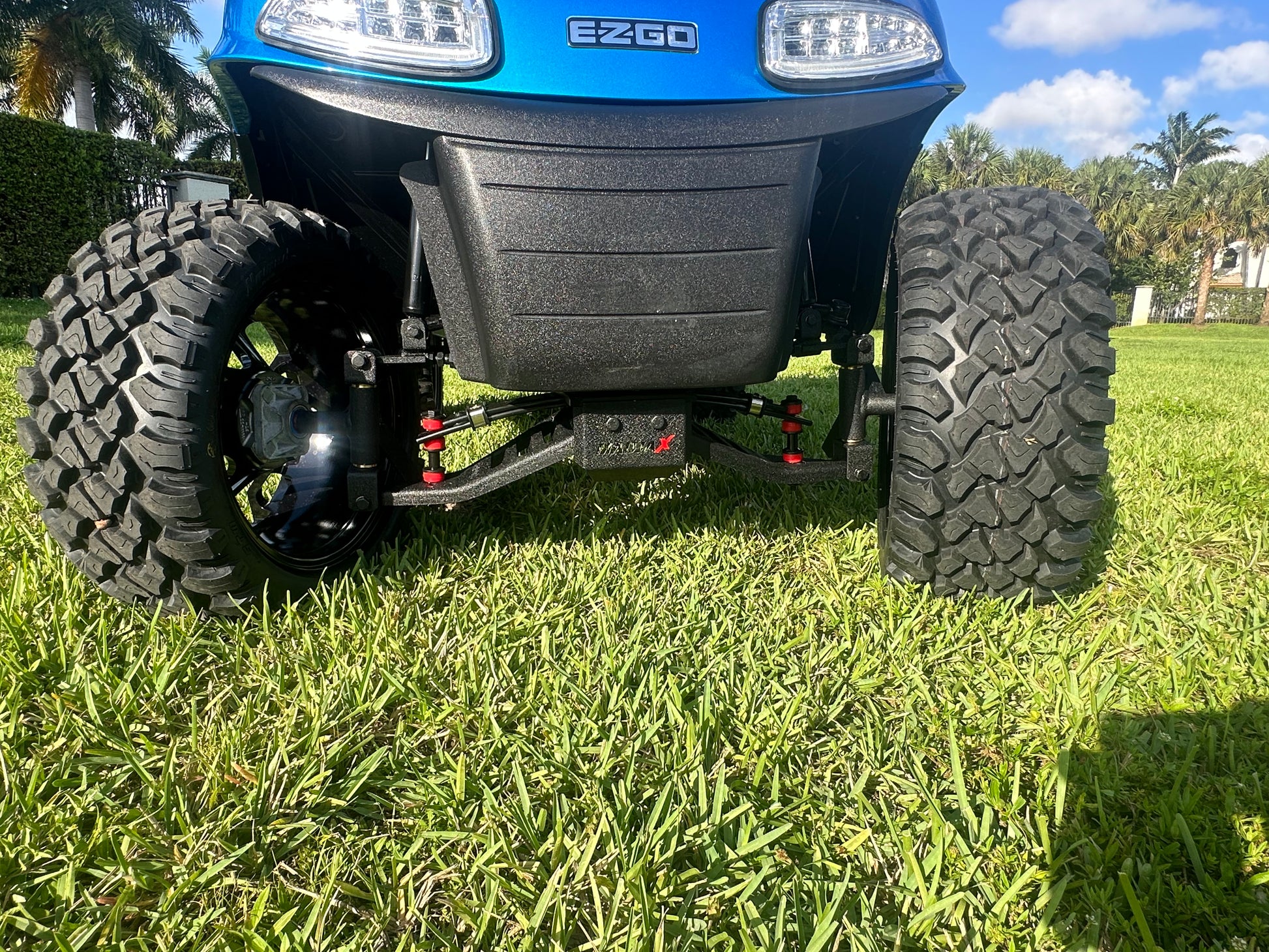 Cutting Edge Golf Carts - 2020 E-Z-GO RXV in Fort Lauderdale, FL. Brilliant blue paint, 4" lift kit, 15"x23" all-terrain wheels, fold-down backseat, deluxe light package with turn signals and horn. Style, performance, and practicality combined.