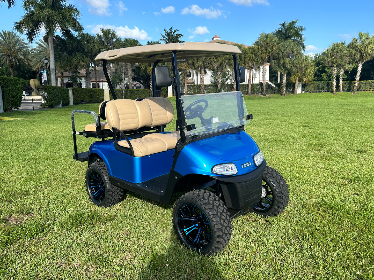 Cutting Edge Golf Carts - 2020 E-Z-GO RXV in Fort Lauderdale, FL. Brilliant blue paint, 4" lift kit, 15"x23" all-terrain wheels, fold-down backseat, deluxe light package with turn signals and horn. Style, performance, and practicality combined.