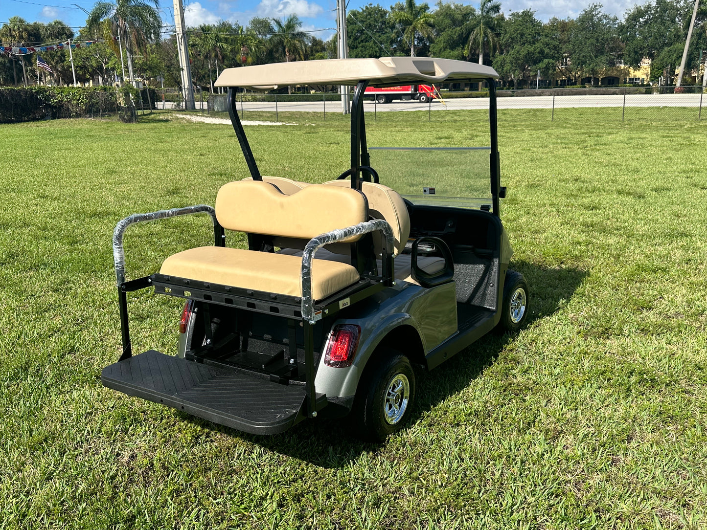 Cutting Edge Golf Carts - 2020 Hypersonic Gray E-Z-GO RXV in Fort Lauderdale, Florida. Stylish, deluxe light kit, fold-down back seat, chrome hubcaps, smooth driving experience.