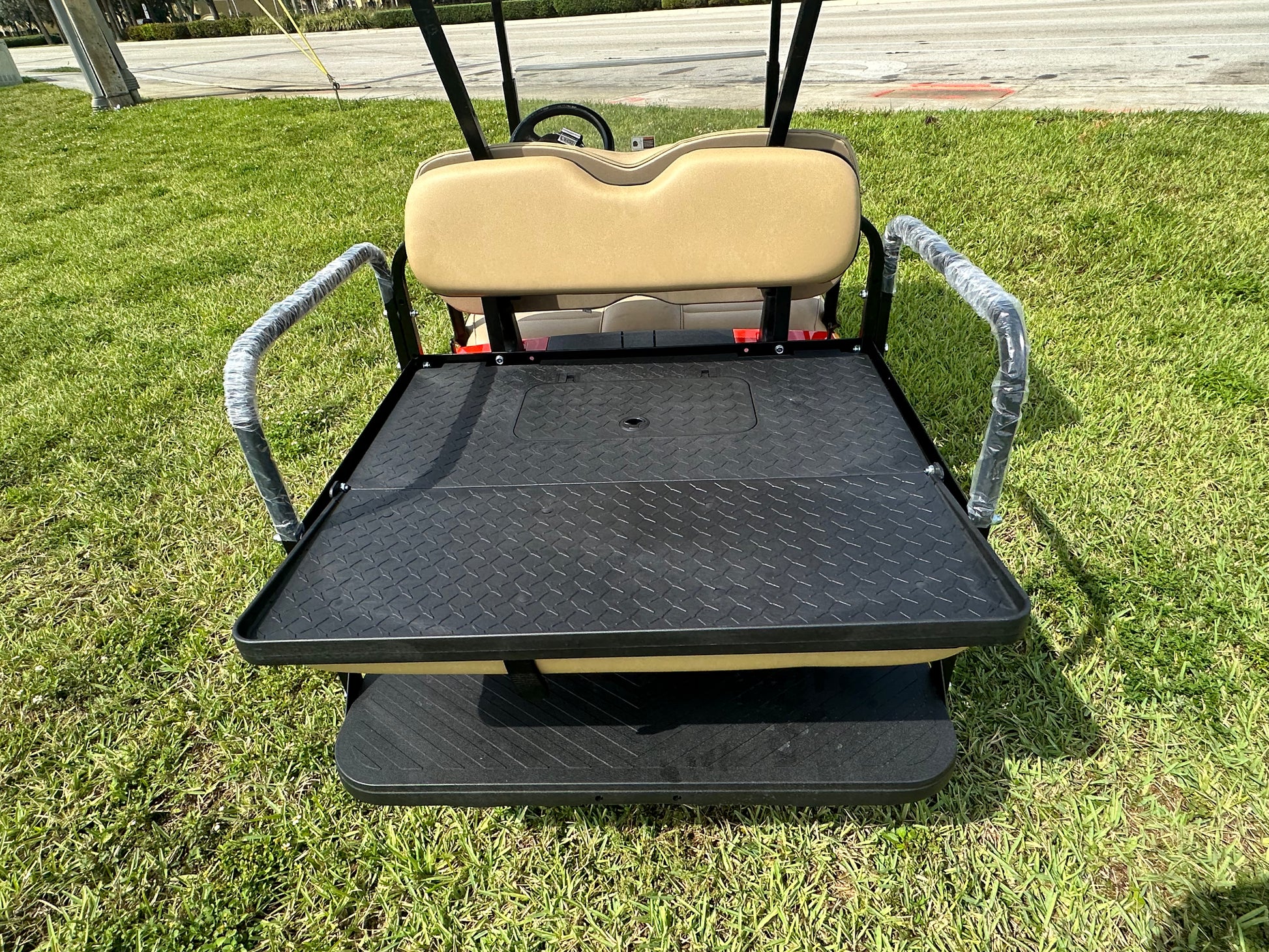 Cutting Edge Golf Carts - Go Mango Orange EZGO RXV: AC Driven, 48V Trojan Batteries, Custom Style, Black Wheel Covers, Back Seat, Deluxe Light Kit - Signals, Brake Light & Horn