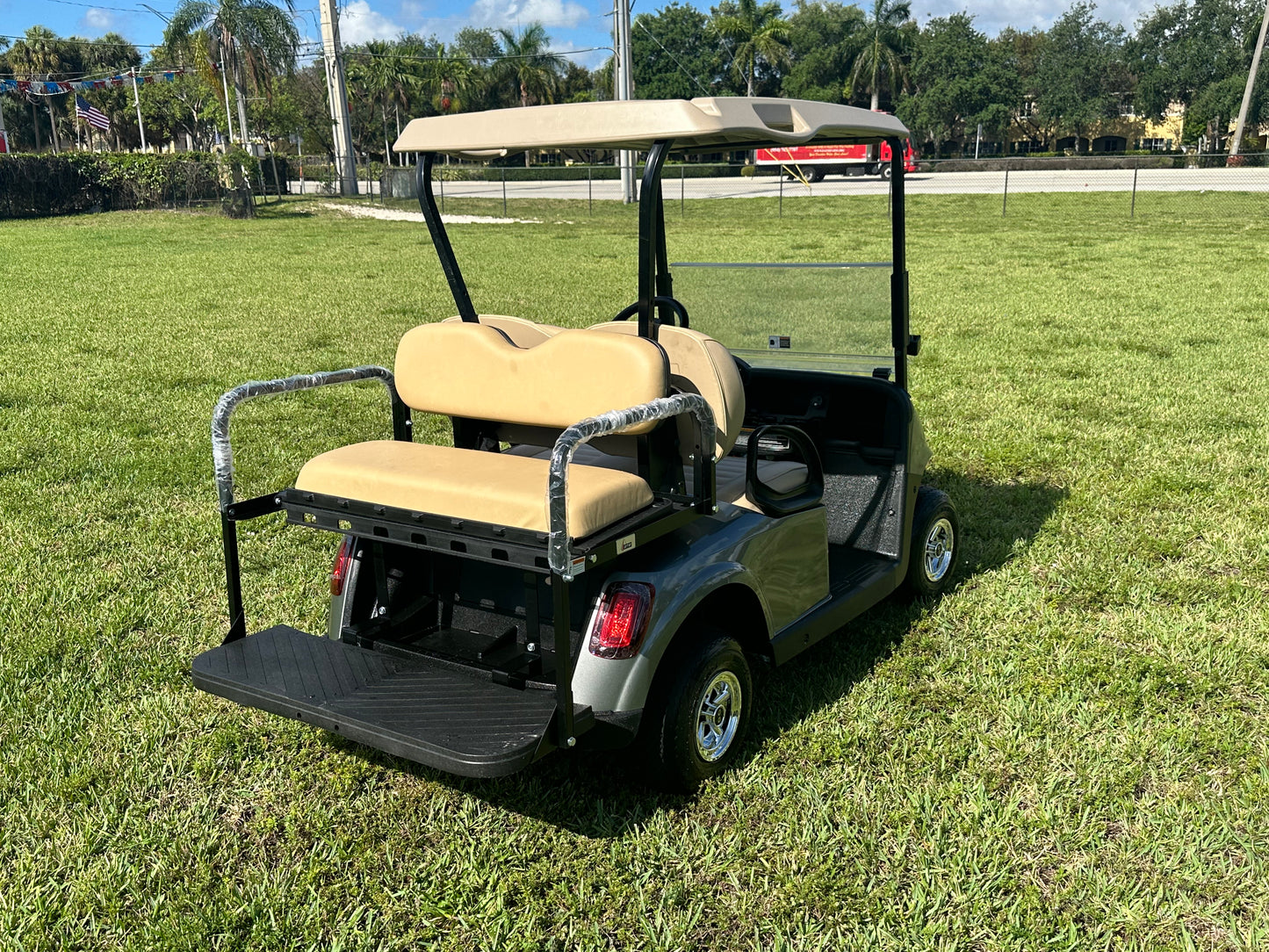 Cutting Edge Golf Carts - 2020 Hypersonic Gray E-Z-GO RXV in Fort Lauderdale, Florida. Stylish, deluxe light kit, fold-down back seat, chrome hubcaps, smooth driving experience.
