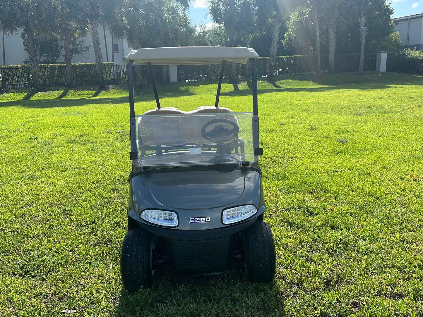 Cutting Edge Golf Carts - 2020 Hypersonic Gray E-Z-GO RXV in Fort Lauderdale, Florida. Stylish, deluxe light kit, fold-down back seat, chrome hubcaps, smooth driving experience.