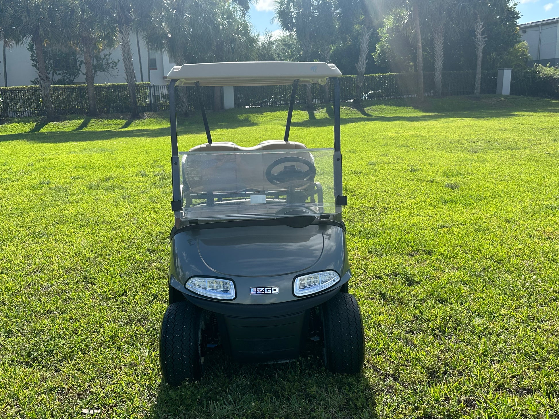 Cutting Edge Golf Carts - 2020 Hypersonic Gray E-Z-GO RXV in Fort Lauderdale, Florida. Stylish, deluxe light kit, fold-down back seat, chrome hubcaps, smooth driving experience.