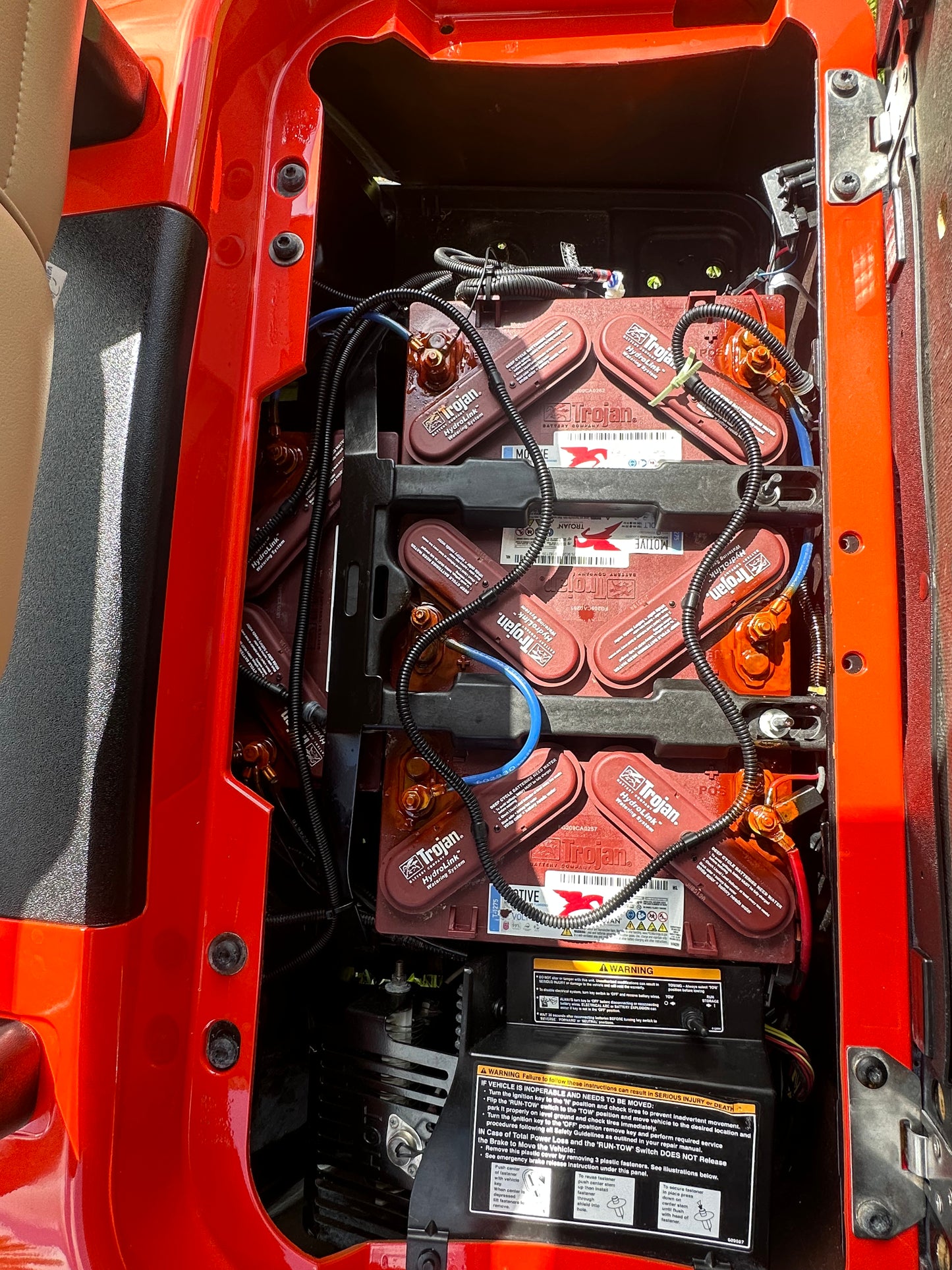 Cutting Edge Golf Carts - Go Mango Orange EZGO RXV: AC Driven, 48V Trojan Batteries, Custom Style, Black Wheel Covers, Back Seat, Deluxe Light Kit - Signals, Brake Light & Horn