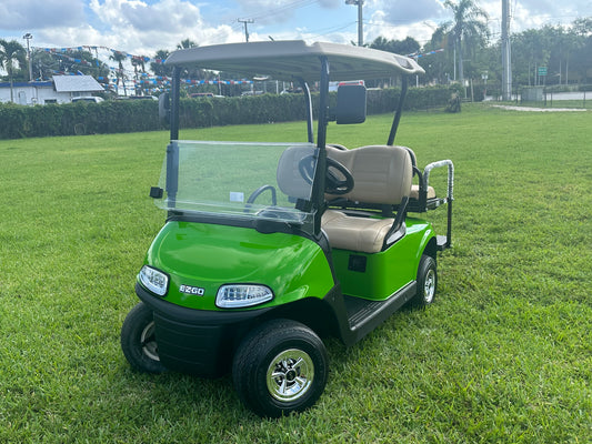 Cutting Edge Golf Carts - 48V 2020 Green Go E-Z-GO RXV, striking color, chrome hubcaps, fold-down back seat, deluxe light package with turn signals and horn.