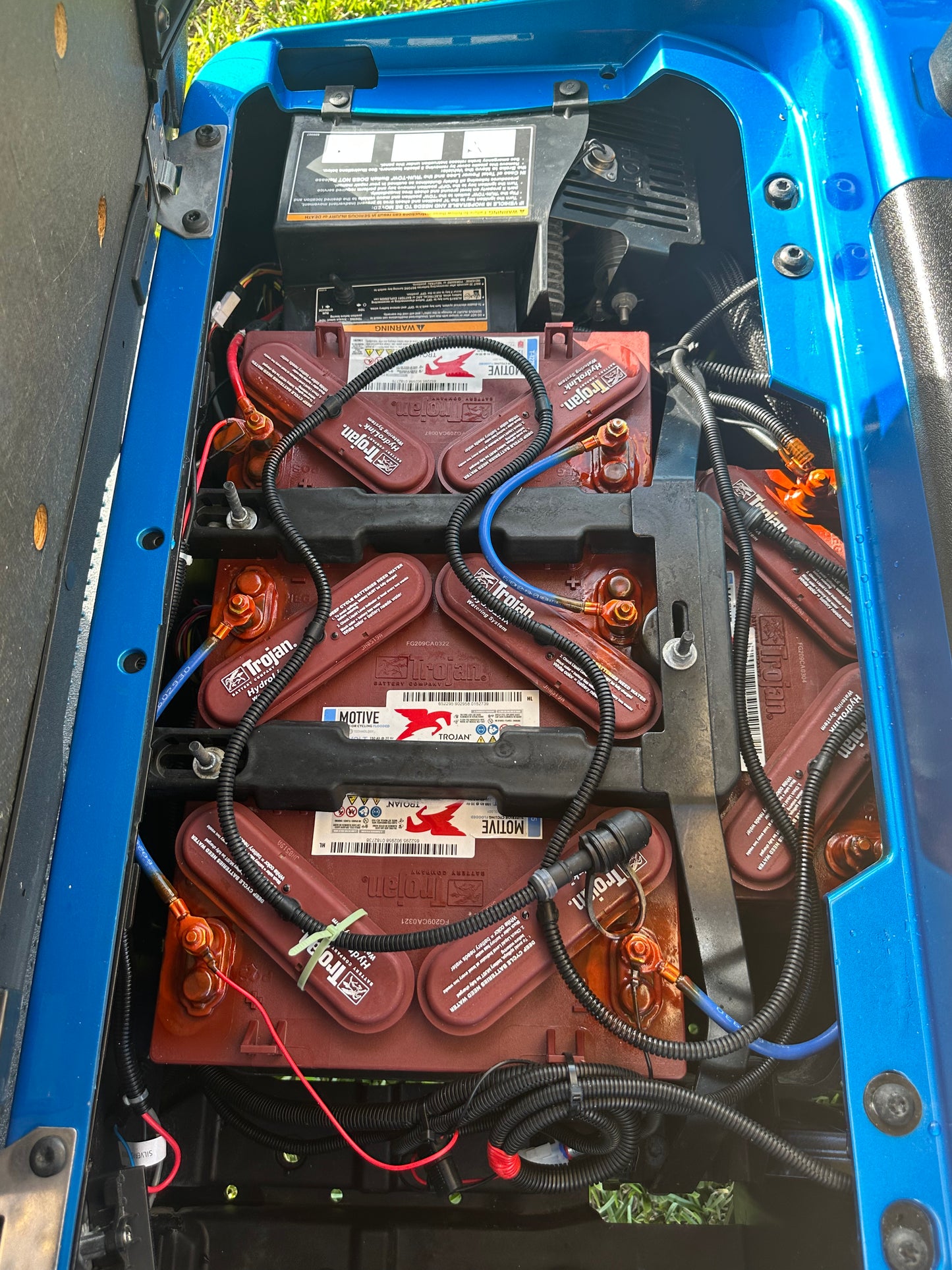 Cutting Edge Golf Carts - 2020 E-Z-GO RXV in Fort Lauderdale, FL. Brilliant blue paint, 4" lift kit, 15"x23" all-terrain wheels, fold-down backseat, deluxe light package with turn signals and horn. Style, performance, and practicality combined.