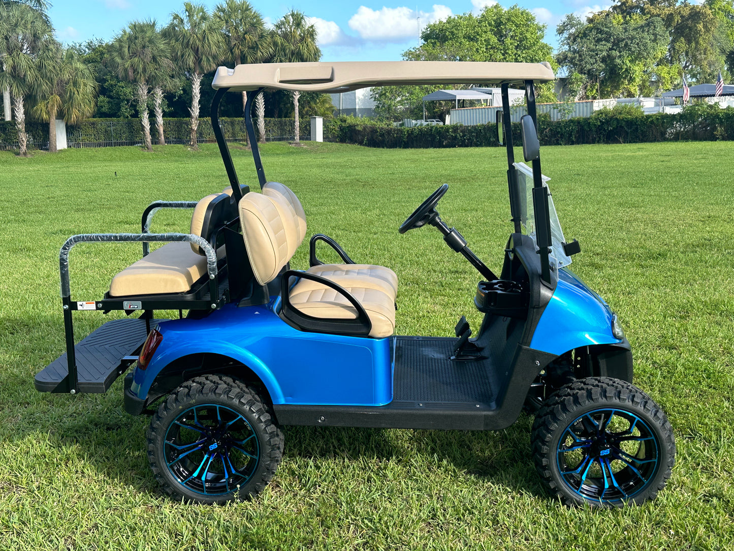 Cutting Edge Golf Carts - 2020 E-Z-GO RXV in Fort Lauderdale, FL. Brilliant blue paint, 4" lift kit, 15"x23" all-terrain wheels, fold-down backseat, deluxe light package with turn signals and horn. Style, performance, and practicality combined.