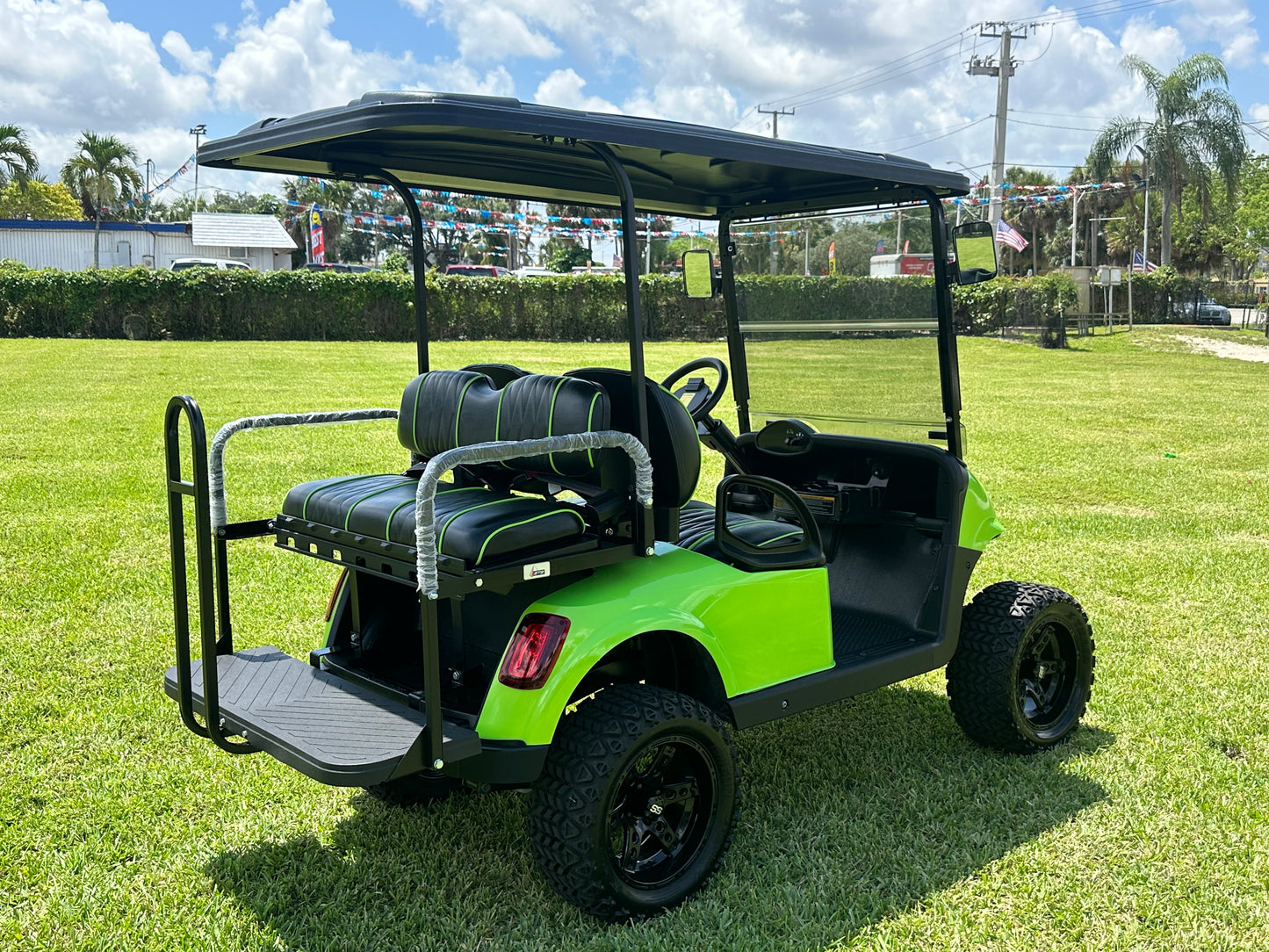 Cutting Edge Golf Carts - 2021 Lamborghini Green E-Z-GO Elite Lithium 48V RXV in Fort Lauderdale, FL. Jakes 6" Lift, custom SS rims, 84" top, deluxe lights, tinted windshield, seatbelts.




