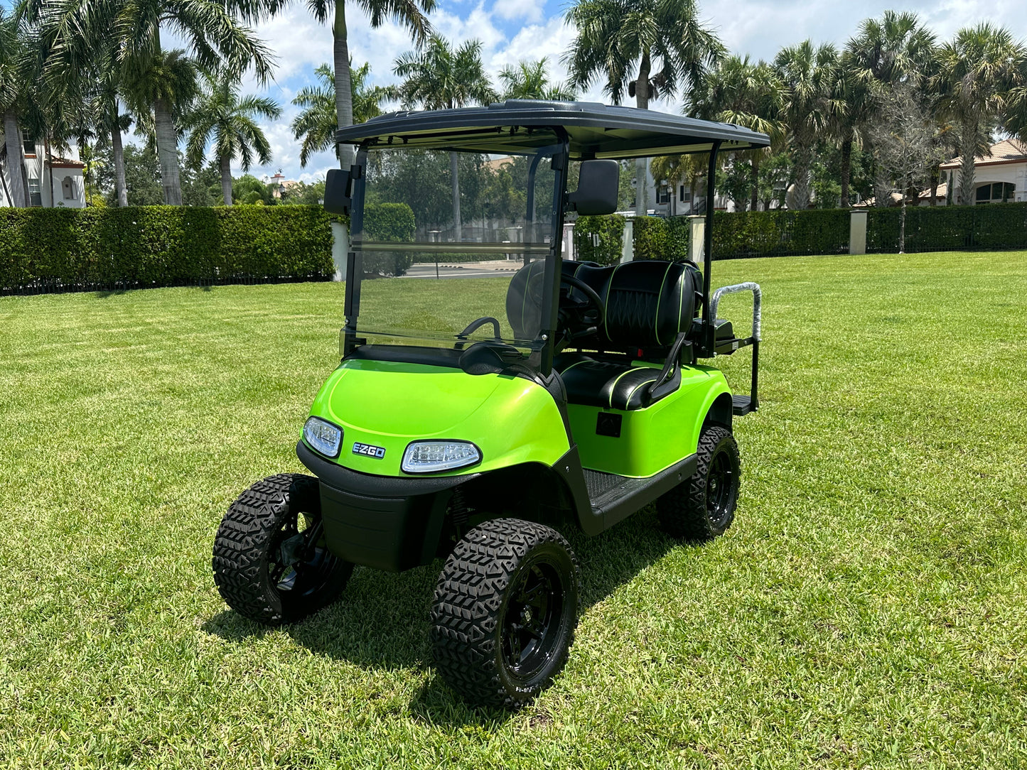 Cutting Edge Golf Carts - 2021 Lamborghini Green E-Z-GO Elite Lithium 48V RXV in Fort Lauderdale, FL. Jakes 6" Lift, custom SS rims, 84" top, deluxe lights, tinted windshield, seatbelts.




