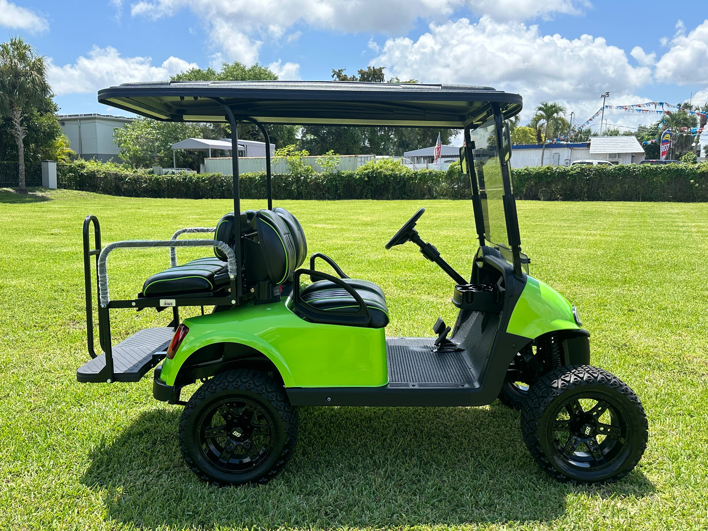 Cutting Edge Golf Carts - 2021 Lamborghini Green E-Z-GO Elite Lithium 48V RXV in Fort Lauderdale, FL. Jakes 6" Lift, custom SS rims, 84" top, deluxe lights, tinted windshield, seatbelts.




