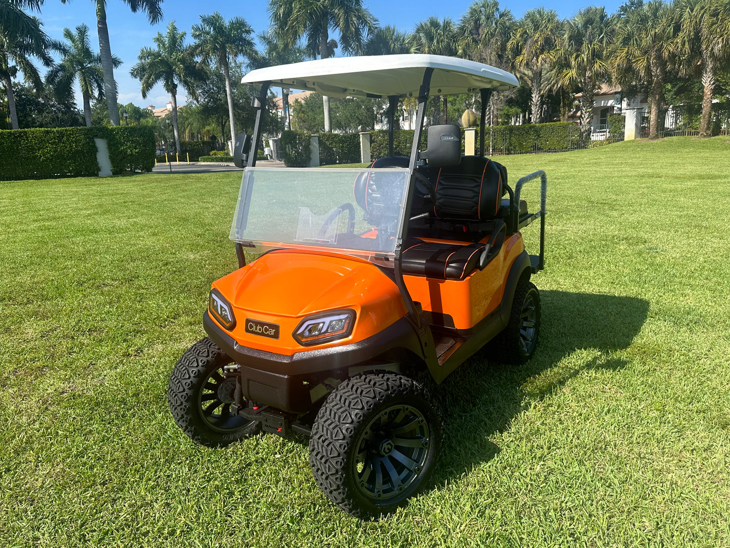 Cutting Edge Golf Carts - 2020 Lamborghini Orange Club Car Tempo in Fort Lauderdale, FL. MadJax 6" lift, custom leather seats, rear fold-down backseat, 14" Modz wheels, 23" AT tires, MadJax Lux lights, RGB running lights, seatbelts, LED mirrors.



