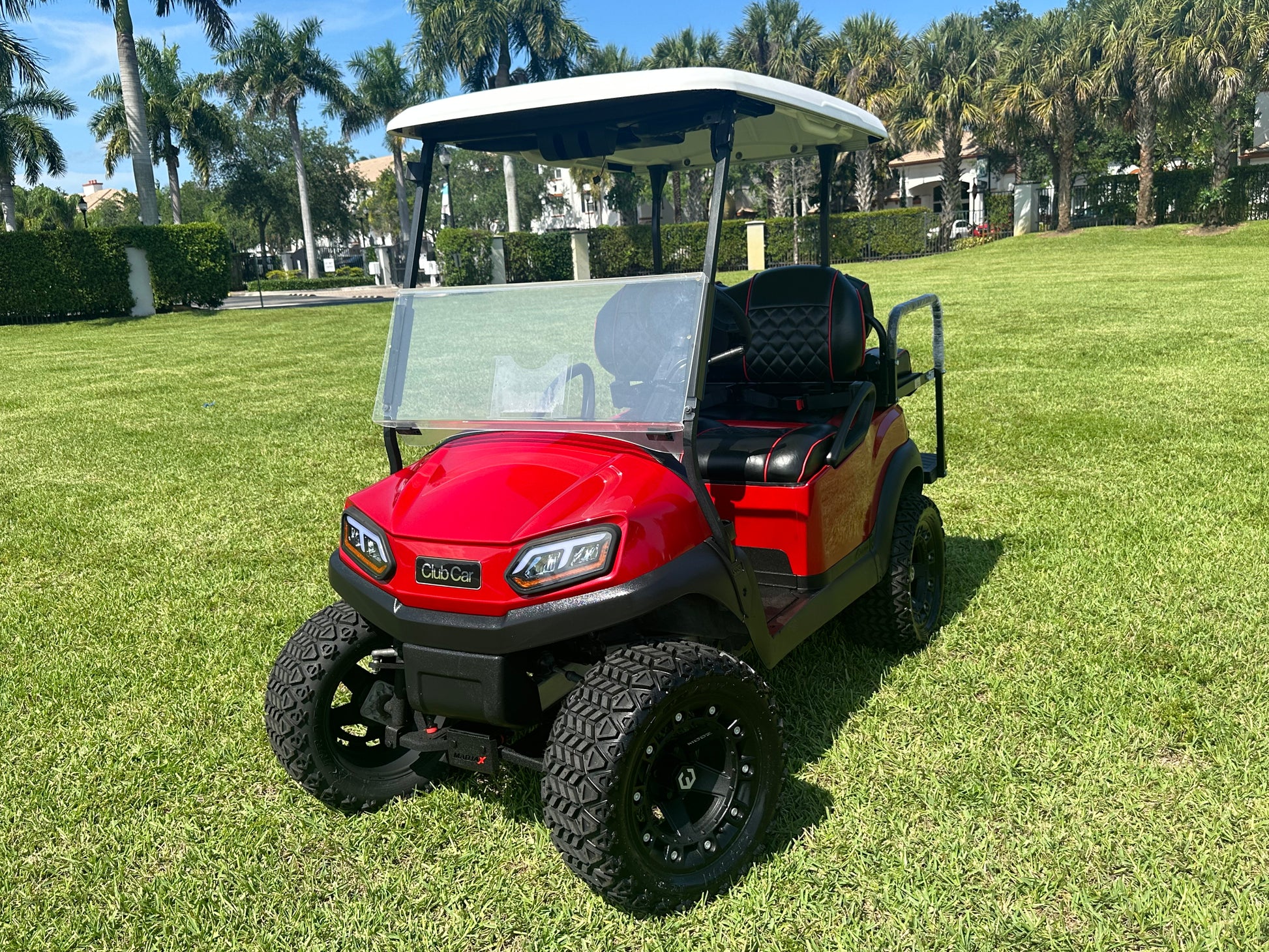 Cutting Edge Golf Carts - 2020 Lamborghini Red Club Car Tempo in Fort Lauderdale, FL. MadJax 6" lift, custom leather seats, rear backseat, Modz wheels, 23" AT tires, MadJax Lux lights, RGB running lights, seatbelts, LED mirrors.



