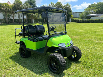 Cutting Edge Golf Carts - 2021 Lamborghini Green E-Z-GO Elite Lithium 48V RXV in Fort Lauderdale, FL. Jakes 6" Lift, custom SS rims, 84" top, deluxe lights, tinted windshield, seatbelts.




