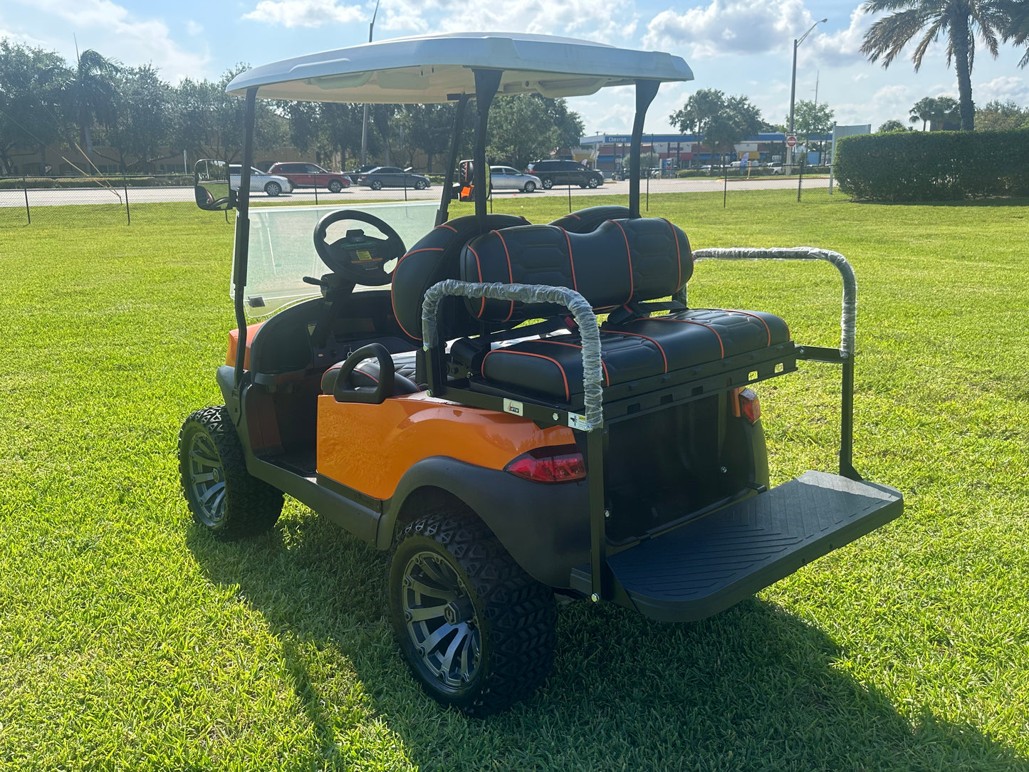 Cutting Edge Golf Carts - 2020 Lamborghini Orange Club Car Tempo in Fort Lauderdale, FL. MadJax 6" lift, custom leather seats, rear fold-down backseat, 14" Modz wheels, 23" AT tires, MadJax Lux lights, RGB running lights, seatbelts, LED mirrors.



