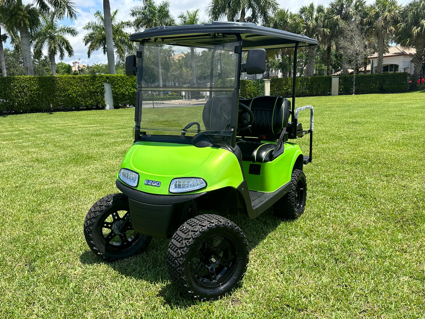 Cutting Edge Golf Carts - 2021 Lamborghini Green E-Z-GO Elite Lithium 48V RXV in Fort Lauderdale, FL. Jakes 6" Lift, custom SS rims, 84" top, deluxe lights, tinted windshield, seatbelts.




