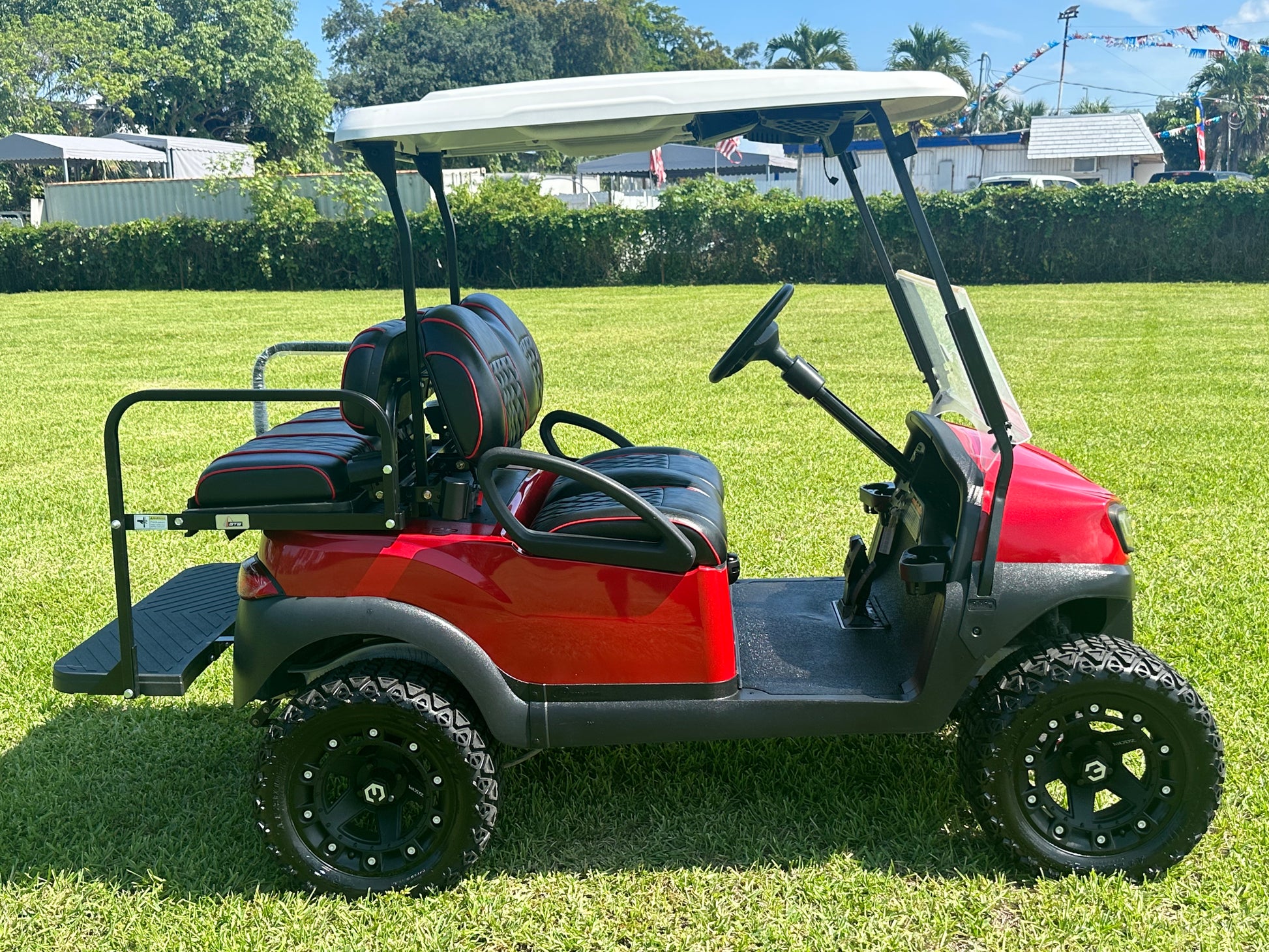 Cutting Edge Golf Carts - 2020 Lamborghini Red Club Car Tempo in Fort Lauderdale, FL. MadJax 6" lift, custom leather seats, rear backseat, Modz wheels, 23" AT tires, MadJax Lux lights, RGB running lights, seatbelts, LED mirrors.



