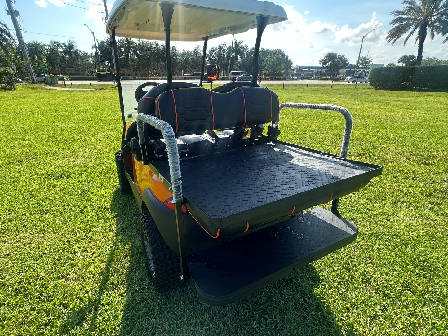 Cutting Edge Golf Carts - 2020 Lamborghini Orange Club Car Tempo in Fort Lauderdale, FL. MadJax 6" lift, custom leather seats, rear fold-down backseat, 14" Modz wheels, 23" AT tires, MadJax Lux lights, RGB running lights, seatbelts, LED mirrors.



