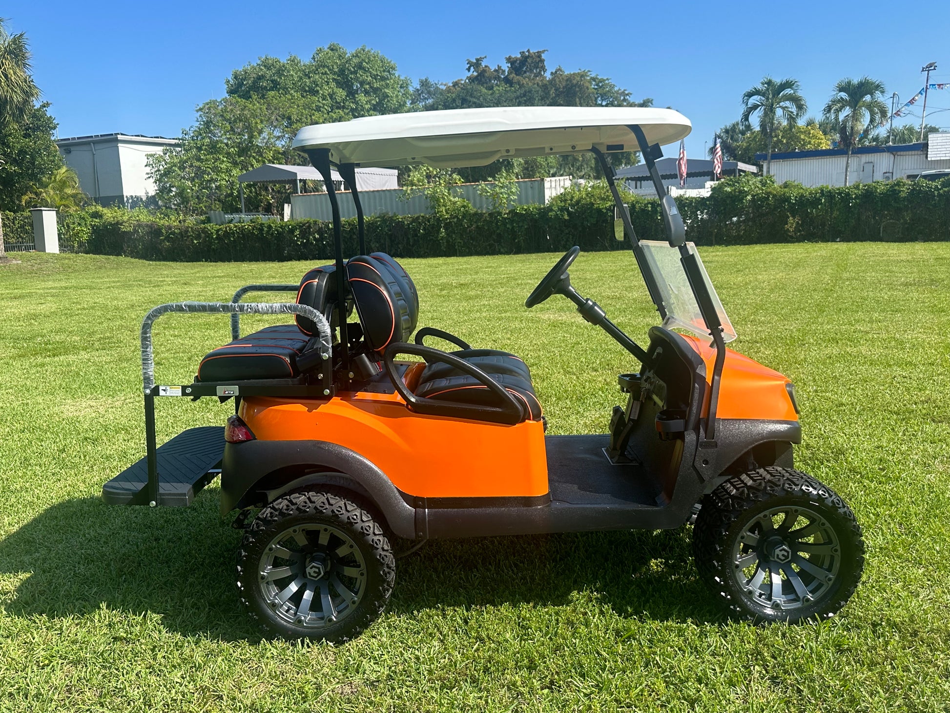 Cutting Edge Golf Carts - 2020 Lamborghini Orange Club Car Tempo in Fort Lauderdale, FL. MadJax 6" lift, custom leather seats, rear fold-down backseat, 14" Modz wheels, 23" AT tires, MadJax Lux lights, RGB running lights, seatbelts, LED mirrors.



