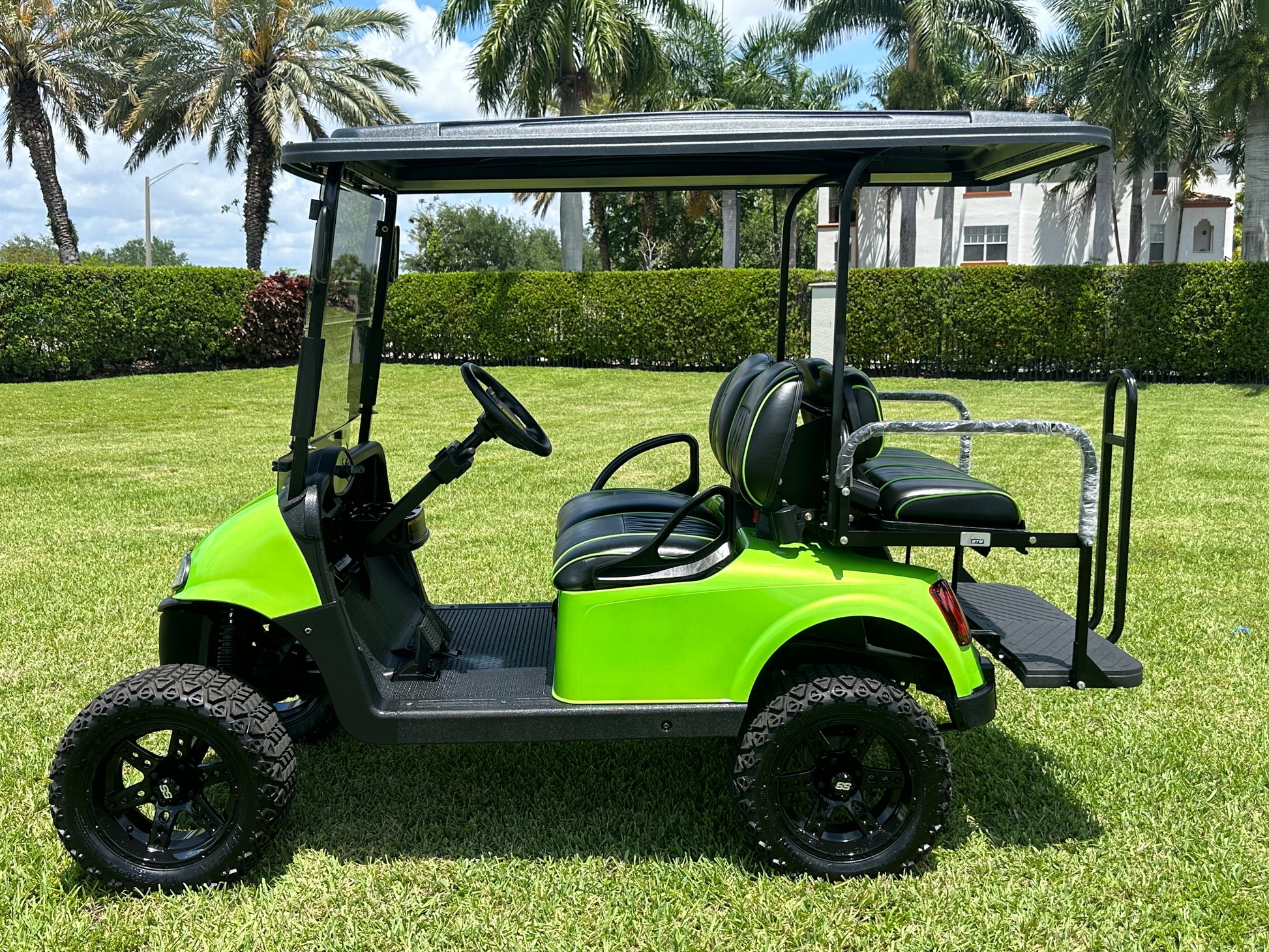 Cutting Edge Golf Carts - 2021 Lamborghini Green E-Z-GO Elite Lithium 48V RXV in Fort Lauderdale, FL. Jakes 6" Lift, custom SS rims, 84" top, deluxe lights, tinted windshield, seatbelts.




