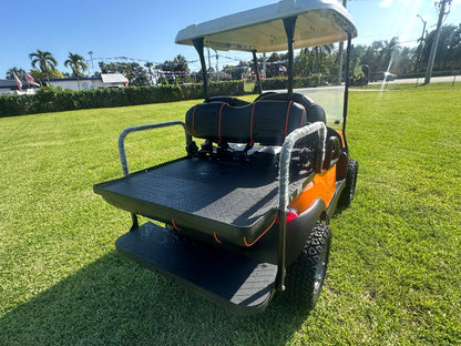 Cutting Edge Golf Carts - 2020 Lamborghini Orange Club Car Tempo in Fort Lauderdale, FL. MadJax 6" lift, custom leather seats, rear fold-down backseat, 14" Modz wheels, 23" AT tires, MadJax Lux lights, RGB running lights, seatbelts, LED mirrors.



