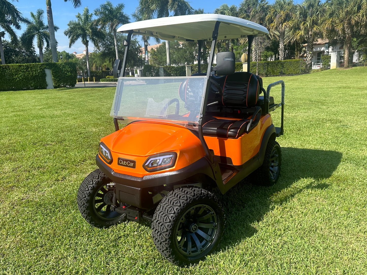 Cutting Edge Golf Carts - 2020 Lamborghini Orange Club Car Tempo in Fort Lauderdale, FL. MadJax 6" lift, custom leather seats, rear fold-down backseat, 14" Modz wheels, 23" AT tires, MadJax Lux lights, RGB running lights, seatbelts, LED mirrors.



