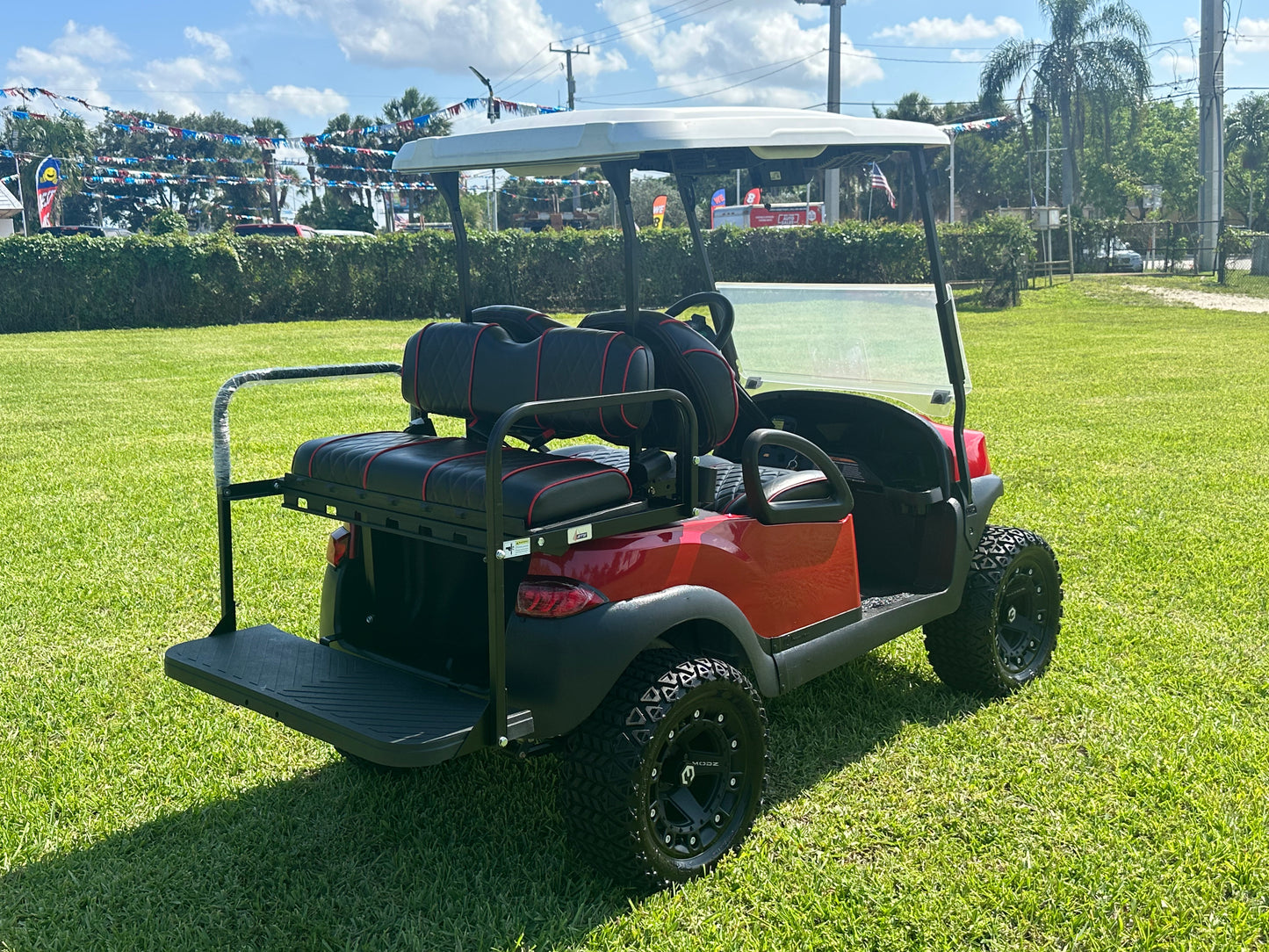 Cutting Edge Golf Carts - 2020 Lamborghini Red Club Car Tempo in Fort Lauderdale, FL. MadJax 6" lift, custom leather seats, rear backseat, Modz wheels, 23" AT tires, MadJax Lux lights, RGB running lights, seatbelts, LED mirrors.



