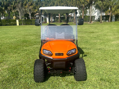 Cutting Edge Golf Carts - 2020 Lamborghini Orange Club Car Tempo in Fort Lauderdale, FL. MadJax 6" lift, custom leather seats, rear fold-down backseat, 14" Modz wheels, 23" AT tires, MadJax Lux lights, RGB running lights, seatbelts, LED mirrors.



