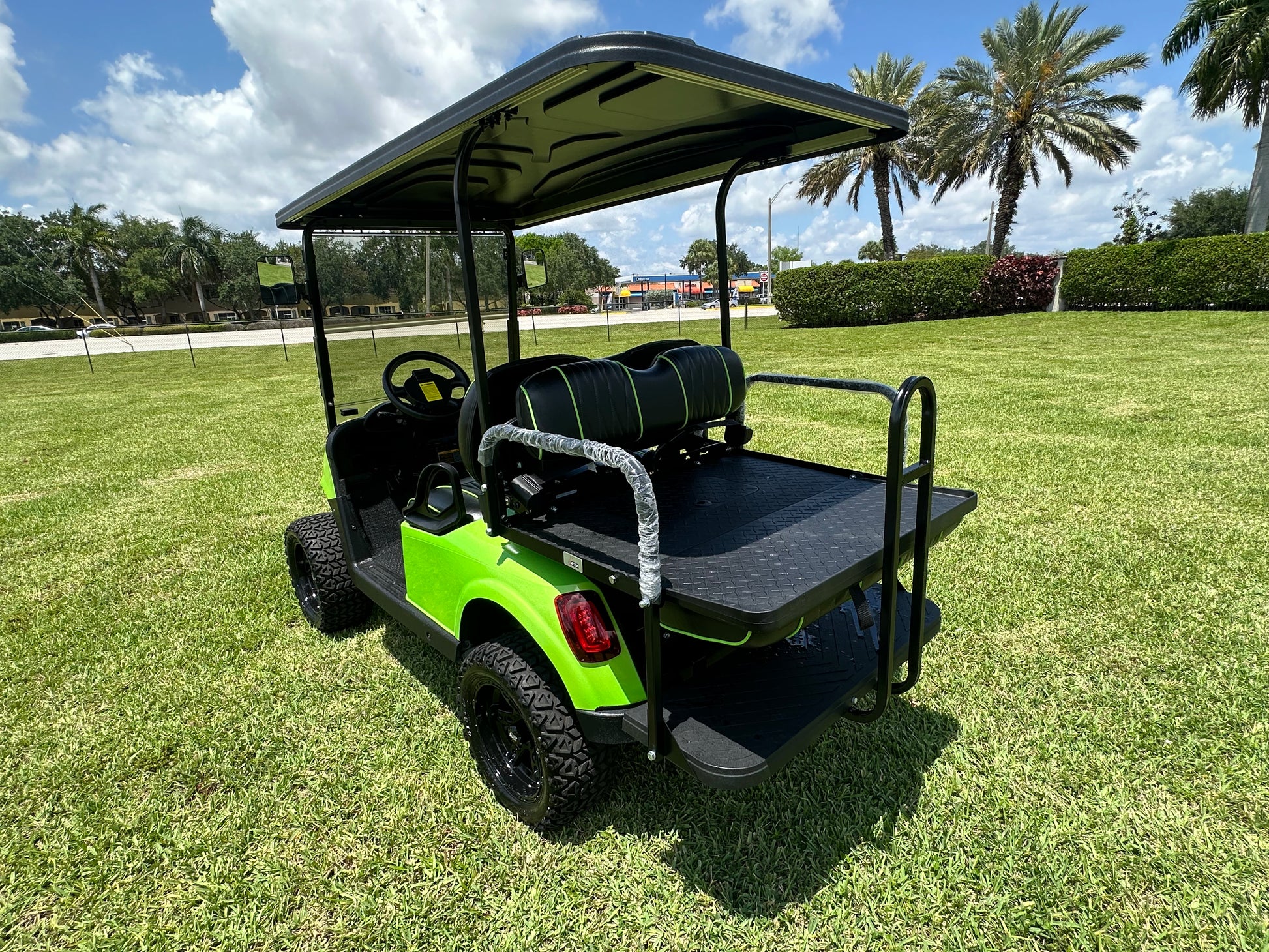 Cutting Edge Golf Carts - 2021 Lamborghini Green E-Z-GO Elite Lithium 48V RXV in Fort Lauderdale, FL. Jakes 6" Lift, custom SS rims, 84" top, deluxe lights, tinted windshield, seatbelts.




