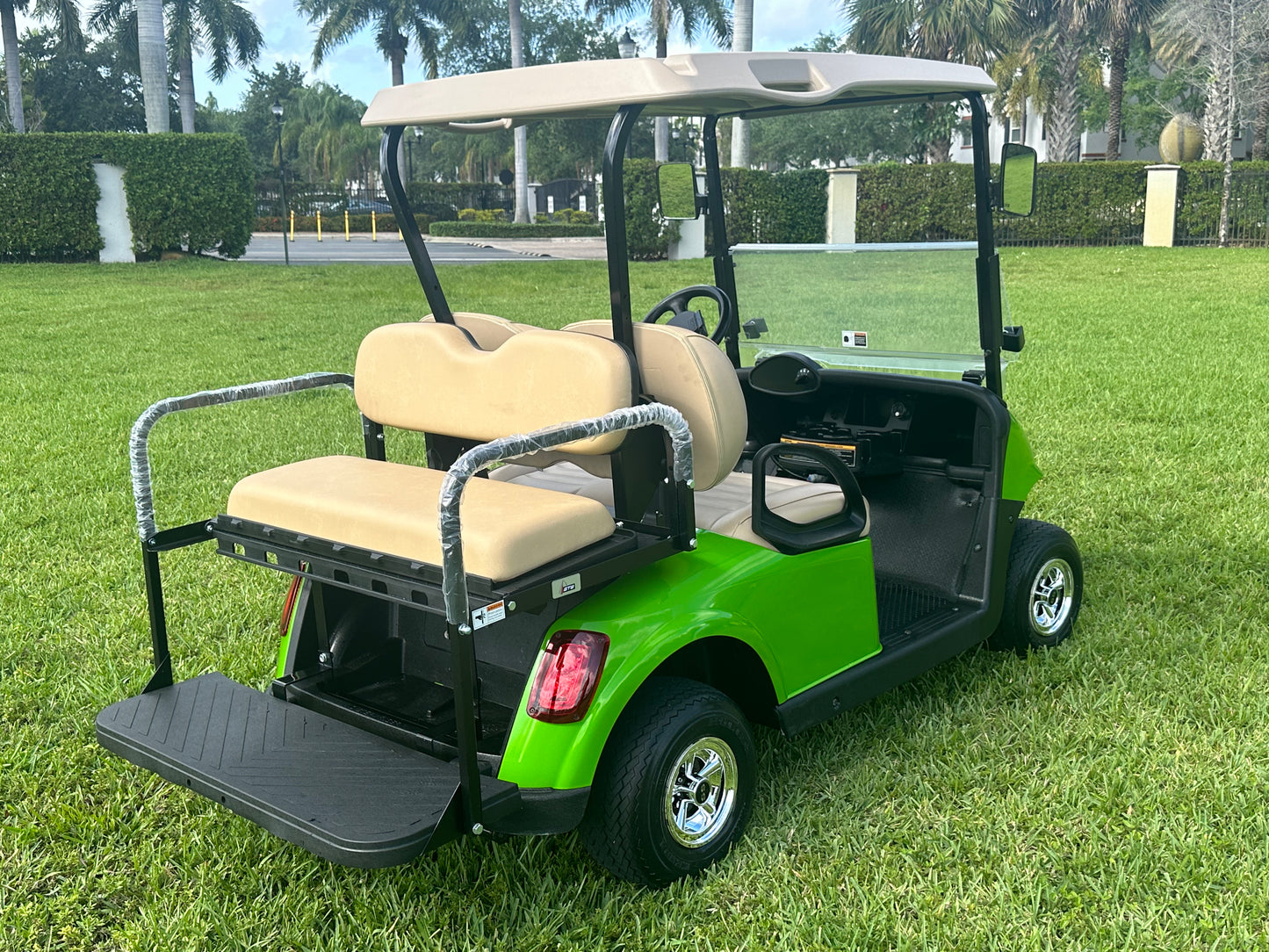 Cutting Edge Golf Carts - 48V 2020 Green Go E-Z-GO RXV, striking color, chrome hubcaps, fold-down back seat, deluxe light package with turn signals and horn.








