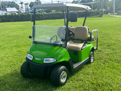 Cutting Edge Golf Carts - 48V 2020 Green Go E-Z-GO RXV, striking color, chrome hubcaps, fold-down back seat, deluxe light package with turn signals and horn.








